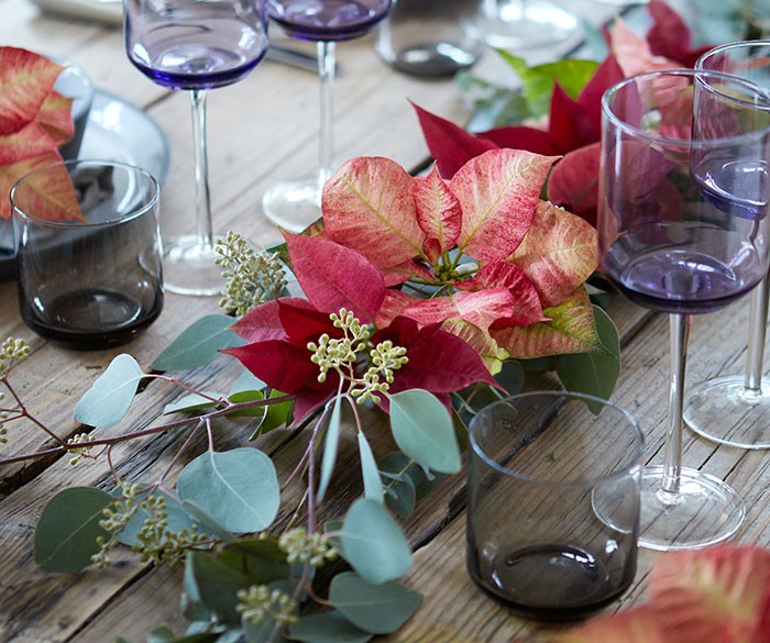 Decoraciones de mesa con poinsettias